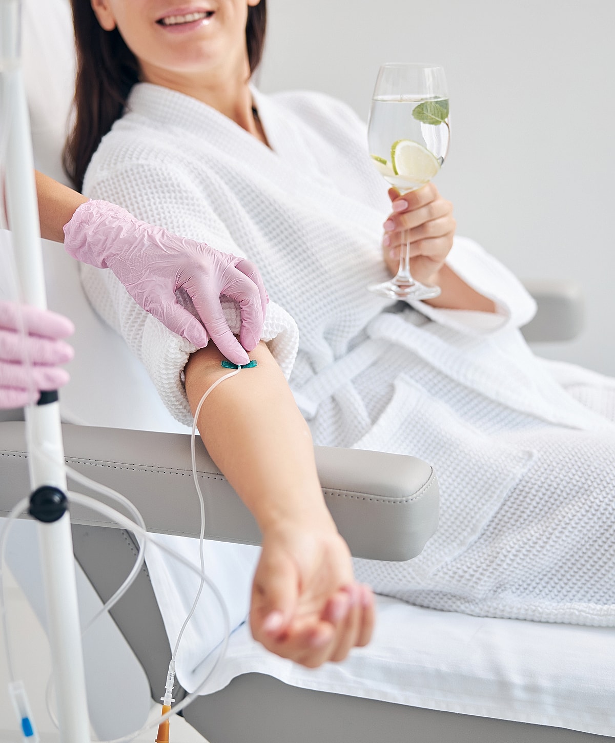 Patient receiving IV treatment while relaxing.